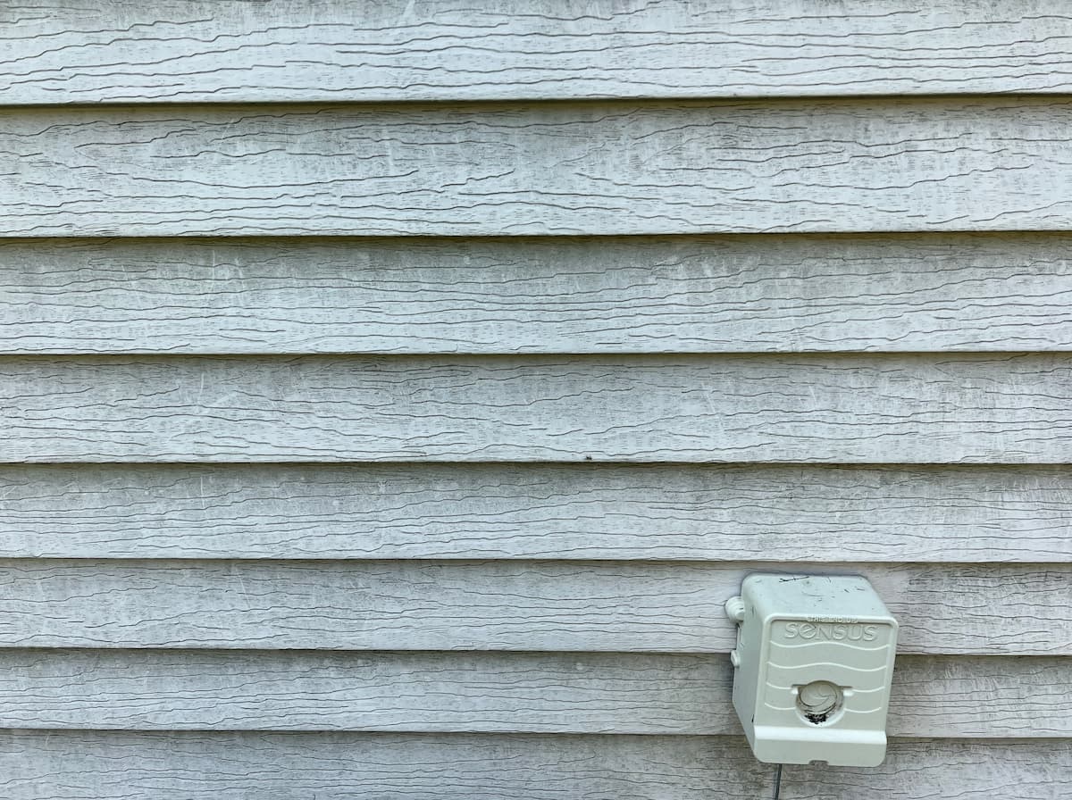 House wash aluminum siding soft wash before - Dressler Ln Rochester Hills MI